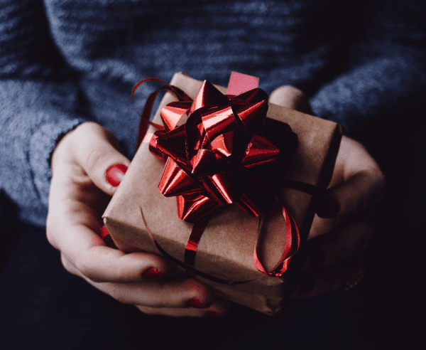 Person holding a present